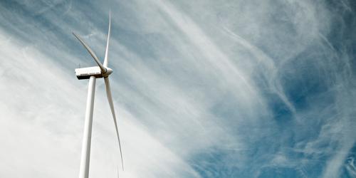 Wind mill and cloudy sky